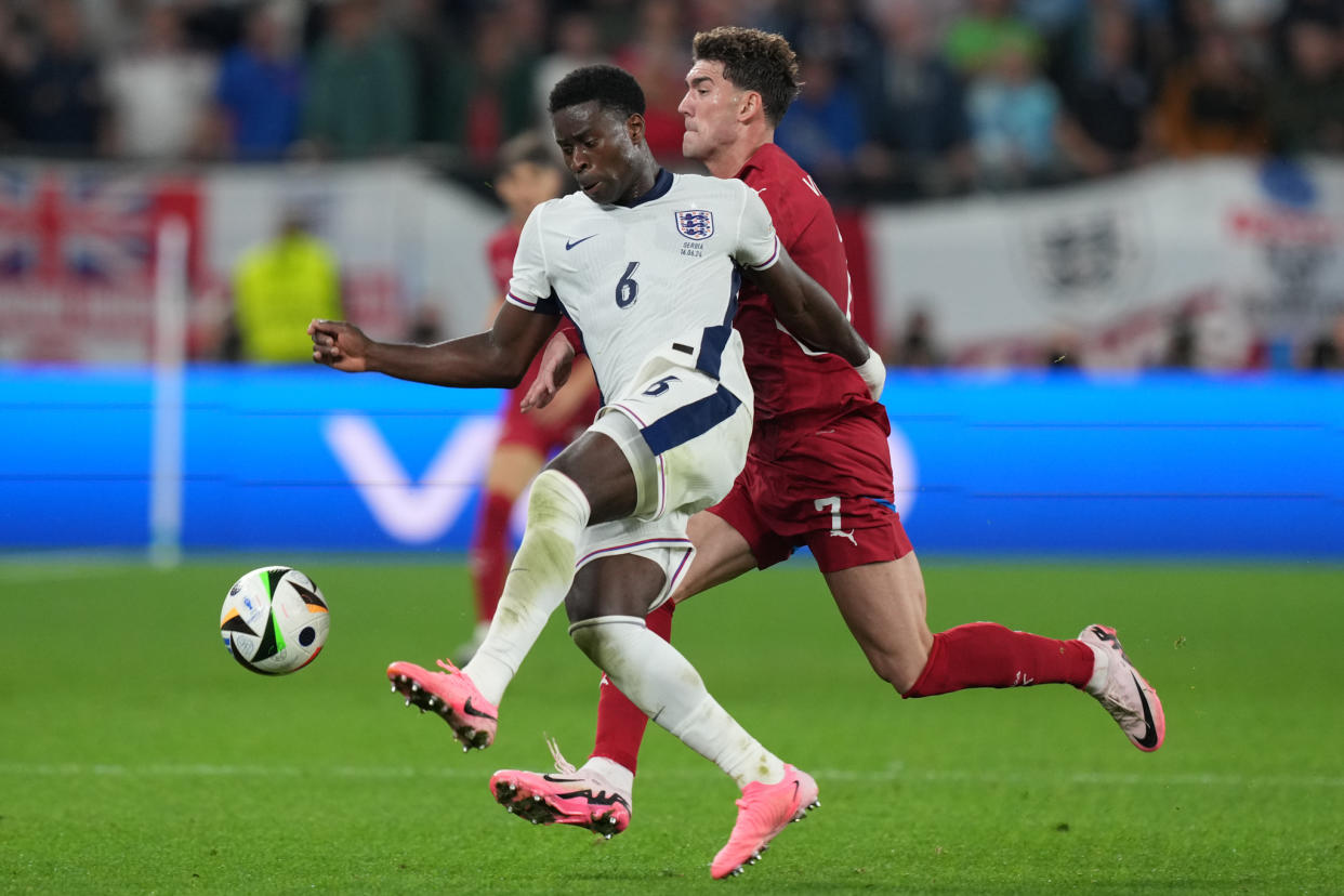 Marc Guehi of England in action against Serbia at Euro 2024