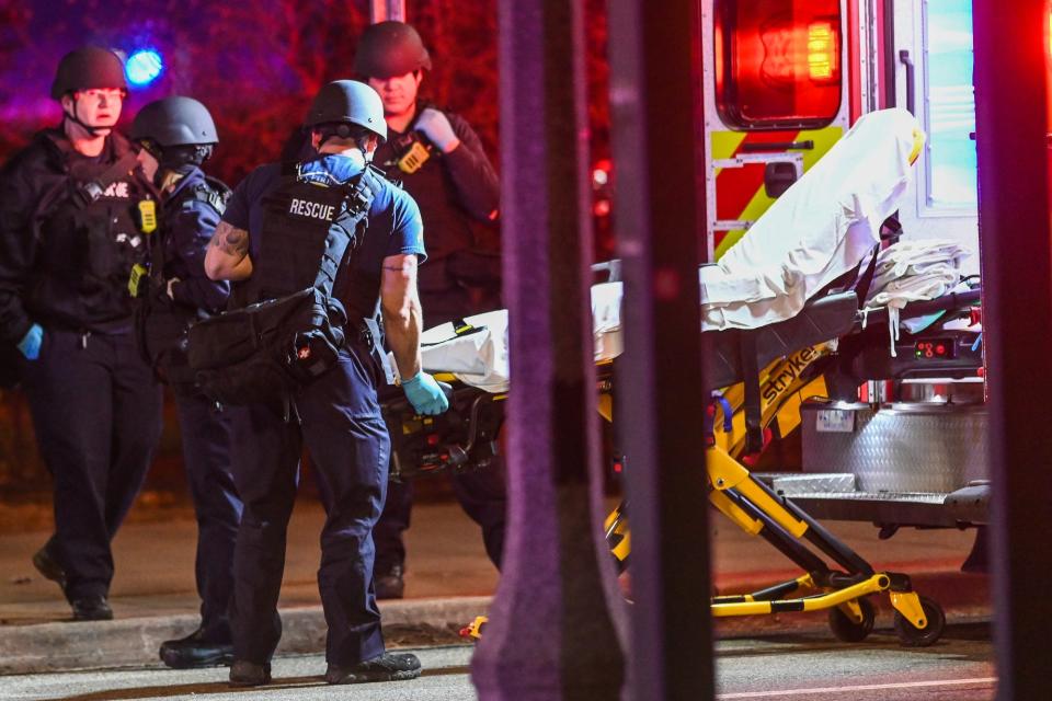 A stretcher is unloaded from an ambulance outside the MSU Union on Monday, Feb. 13, 2023, on the Michigan State University campus in East Lansing.