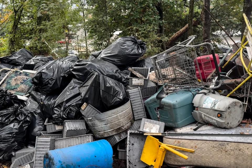 Charity workers and authorities were cleaning up the area (pictured) (We Heart Seattle/Facebook)