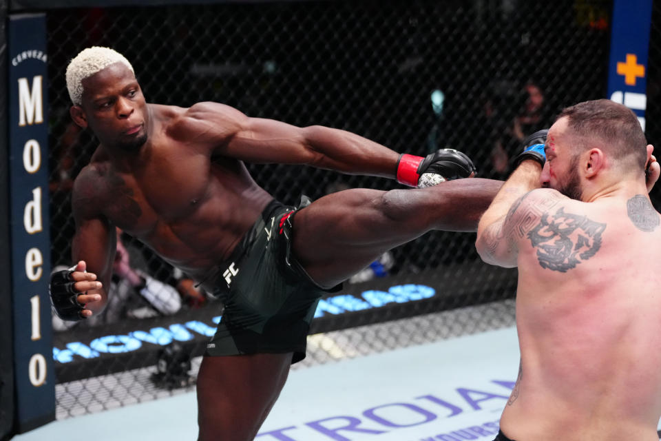 LAS VEGAS, NEVADA – OCTOBER 29: (L-R) Phil Hawes kicks Roman Dolidze of Georgia in a middleweight fight during the UFC Fight Night event at UFC APEX on October 29, 2022 in Las Vegas, Nevada. (Photo by Jeff Bottari/Zuffa LLC)