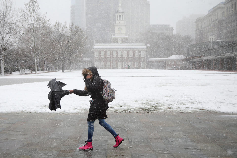 <span class="icon icon--xs icon__camera">  </span> <span class="credit font--s-m upper black"> <b>TIM TAI / Staff Photographer</b> </span> <div class="caption space-half--right font--s-m gray--med db"> A woman braves the snow and wind along Independence Mall in Center City on Friday. Get ready for more. </div>