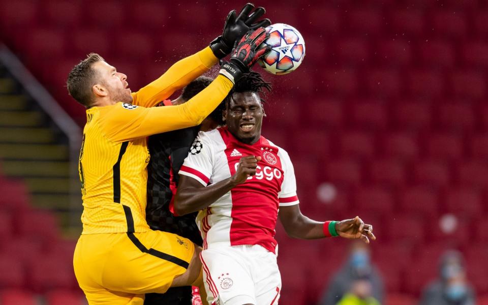 Adrian of FC Liverpool and Lassina Traore of Ajax Amsterdam battle for the ball during the UEFA Champions League Group D stage match between Ajax Amsterdam and Liverpool FC at Johan Cruijff Arena on October 21, 2020 in Amsterdam, Netherlands - DeFodi Images /DeFodi Images 