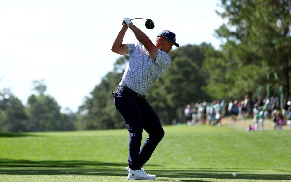 Bryson DeChambeau of the United States plays his shot from the 15th tee