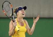 Elina Svitolina of Ukraine celebrates after winning her match against Serena Williams. REUTERS/Kevin Lamarque