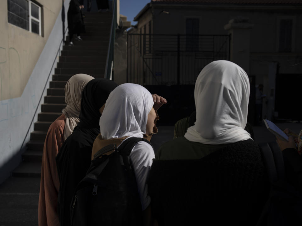 Students speak during an interview at Ibn Khaldoun, a private Muslim school, in Marseille, southern France, Thursday, April 18, 2024. Started in 2009 with 25 students, Ibn Khaldoun now enrolls nearly 400 as one of the few private Muslim schools under contract with the French government. That means they’re financially supported but have to abide by strict curricular and behavioral requirements. (AP Photo/Daniel Cole)