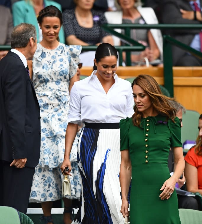 Kate Middleton wearing a green Dolce & Gabbana dress to watch the women’s singles final. - Credit: Shutterstock