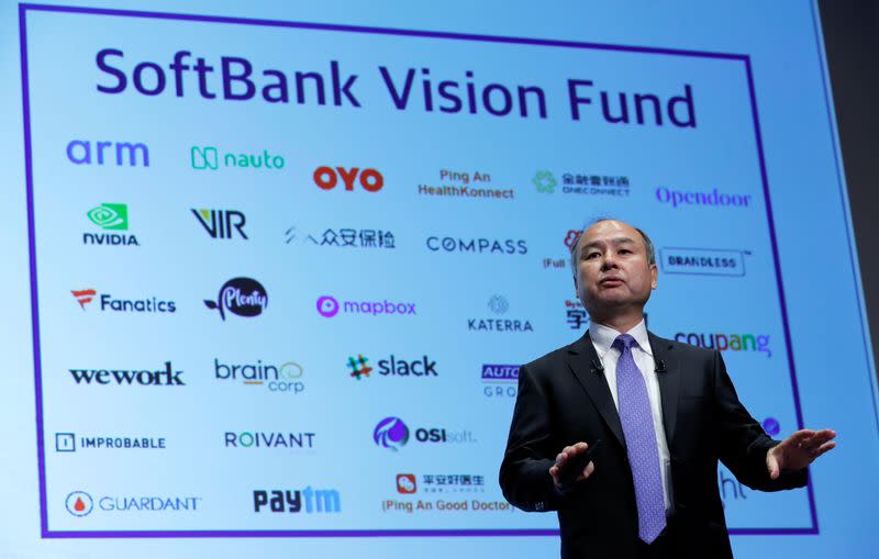 FILE PHOTO: Japan's SoftBank Group Corp Chief Executive Masayoshi Son attends a news conference in Tokyo