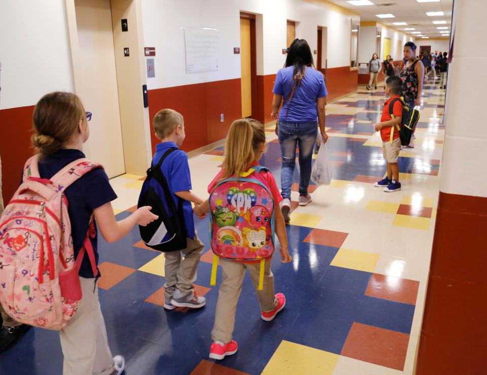 Children walk down a hallway on Aug. 1, 2018, the first day of school at Cesar Chavez Elementary School on SE Grand Blvd. Like in last year’s edition, the 2022 Kids Count report showed that Oklahoma children were struggling to keep up in school: 71% of fourth-graders weren’t proficient in reading, and 74% of eighth-graders weren’t proficient in math.