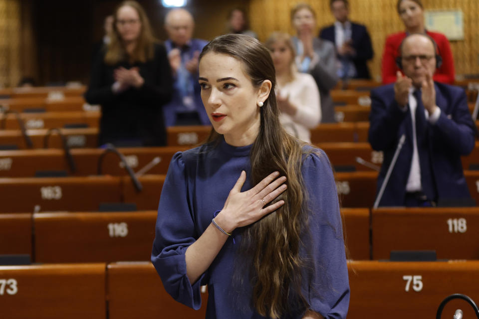 Oleksandra Matviichuk, an Ukrainian human rights lawyer, head of the Center for Civil Liberties and 2022 Nobel Peace Prize laureate, reacts as she his applauded after her speech at the Council of Europe Parliamentary Assembly (PACE) in Strasbourg, eastern France, Thursday, Jan.26, 2023. The Council of Europe Parliamentary Assembly is holding an urgent debate on the legal and human rights aspects of the Russian's aggression against Ukraine. (AP Photo/Jean-Francois Badias)