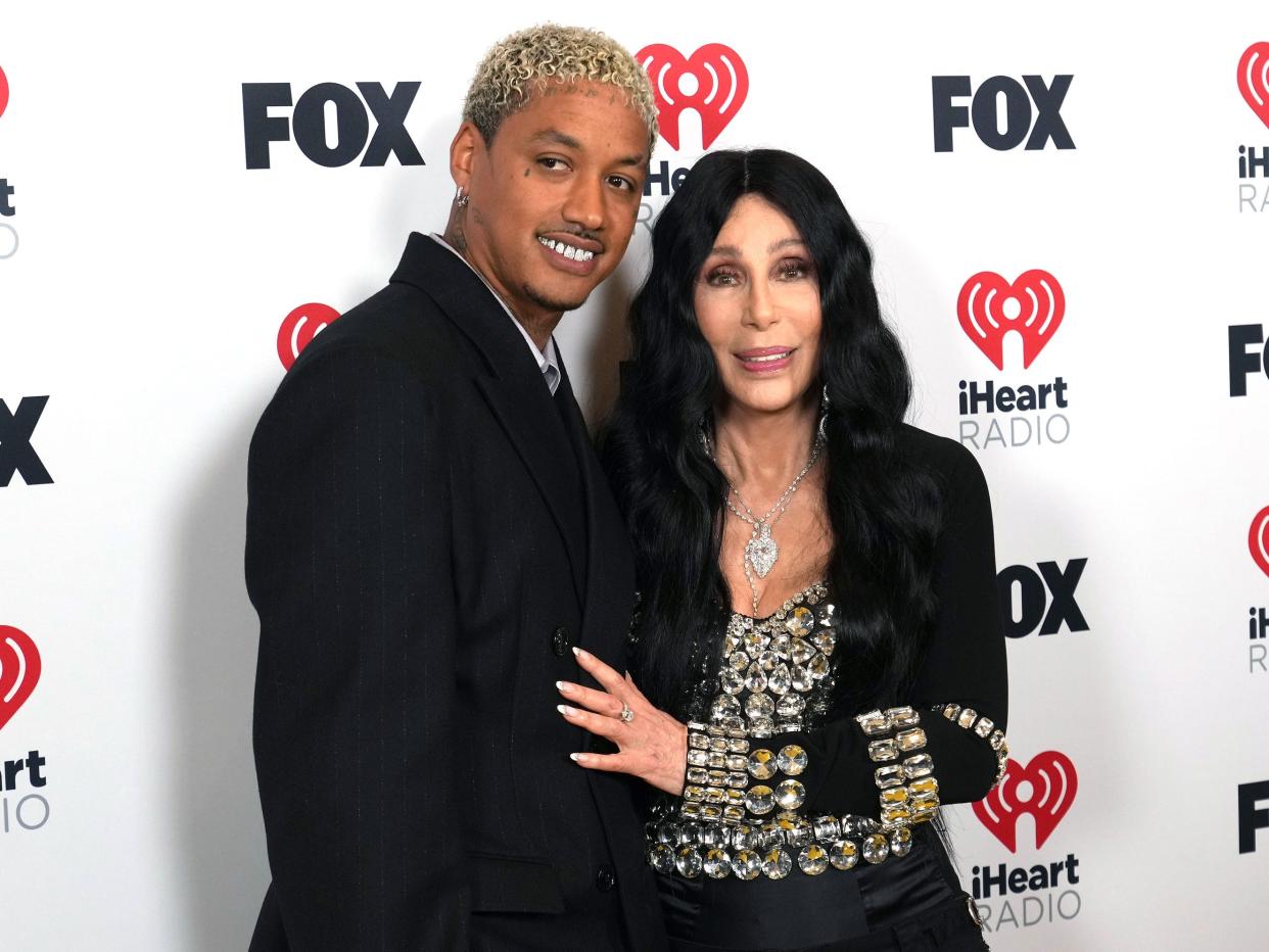 Alexander Edwards and Cher pose in the press room during the 2024 iHeartRadio Music Awards at Dolby Theatre on April 01, 2024 in Hollywood, California.