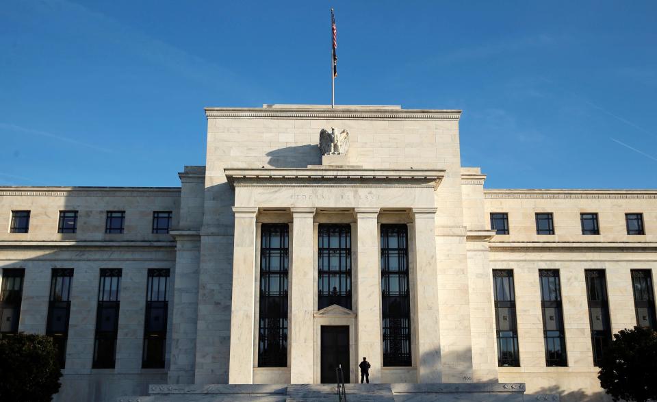 A police officer keeps watch in front of the U.S. Federal Reserve in Washington October 12, 2016. REUTERS/Kevin Lamarque/File Photo