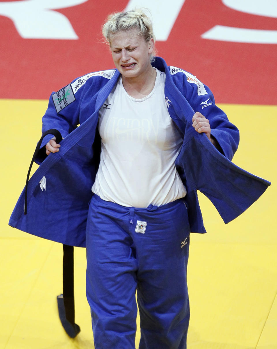 Kayla Harrison of the U.S. reacts after winning her under 78kg women's bronze medal bout against Marhinde Verkerk of the Netherlands at the World Judo Championships in Paris August 26, 2011. REUTERS/Yves Herman