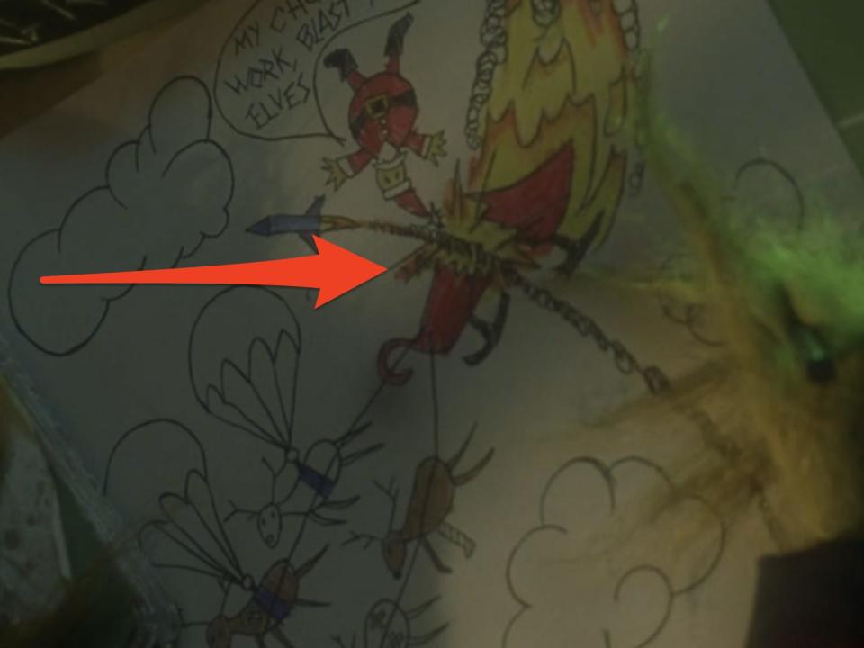 arrow pointing at grinch's christmas drawing of snata's sleigh in how the grinch stole christmas