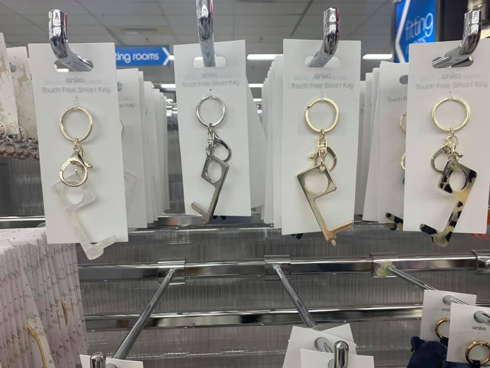 Kmart fans have discovered a new handy touch-free keyring that eliminates the need to touch door handles in public spaces as well as things like elevator buttons. Photo: Facebook