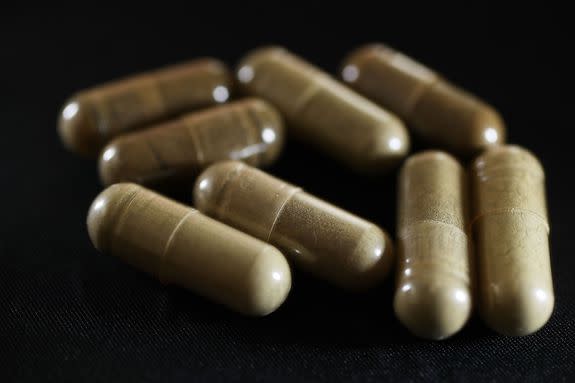 MIAMI, FL - MAY 10:  In this photo illustration, capsules of the drug Kratom are seen on May 10, 2016 in Miami, Florida. The herbal supplement is a psychoactive drug derived from the leaves of the kratom plant and it's been reported that people are using the supplement to get high and some states are banning the supplement.  (Photo by Joe Raedle/Getty Images)