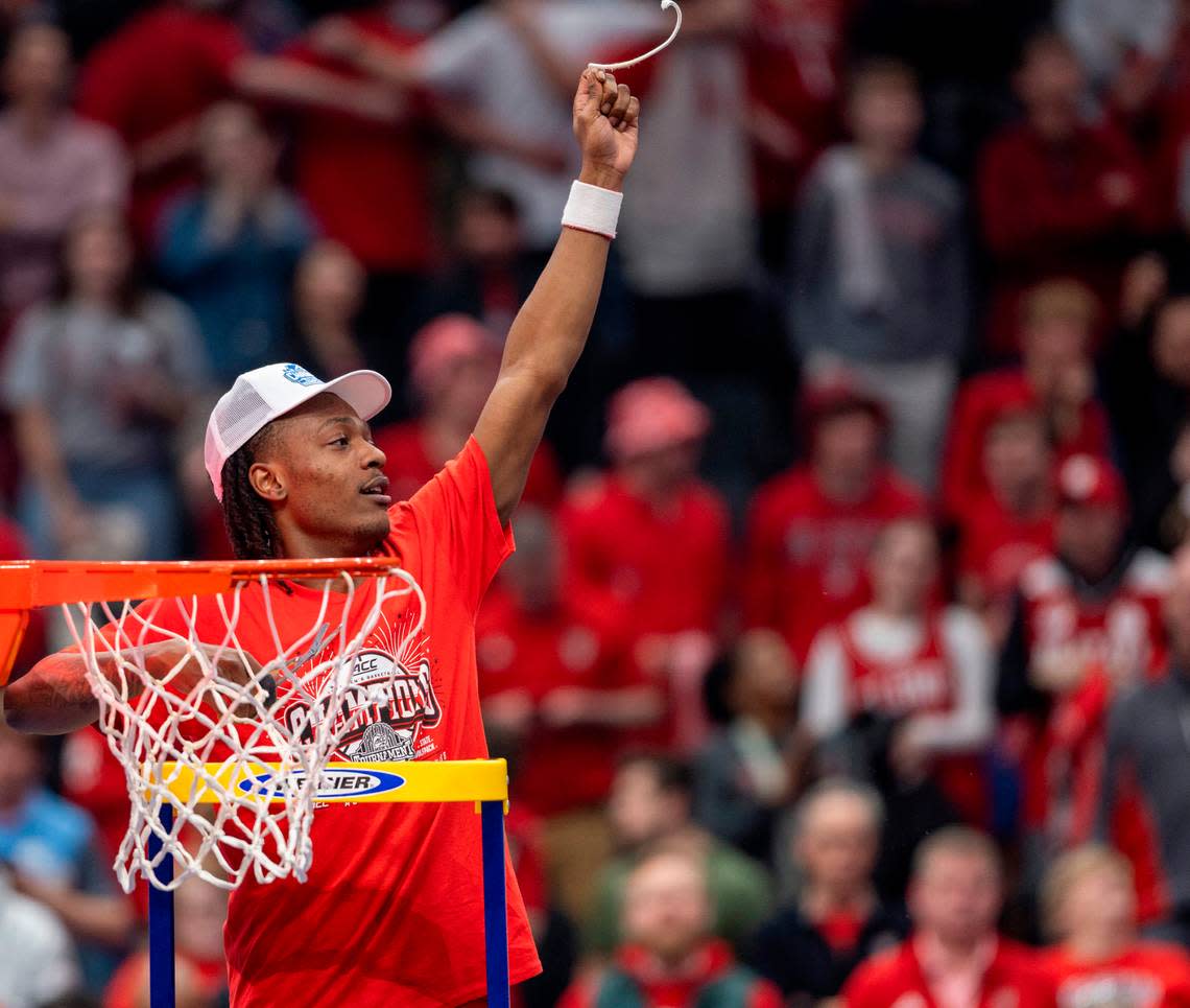 N.C. State’s N.C State’s D.J. Horne (0) cuts down the net following the Wolfpack’s 84-76 victory over North Carolina in the ACC Men’s Basketball Tournament Championship at Capitol One Arena on Saturday, March 16, 2024 in Washington, D.C.