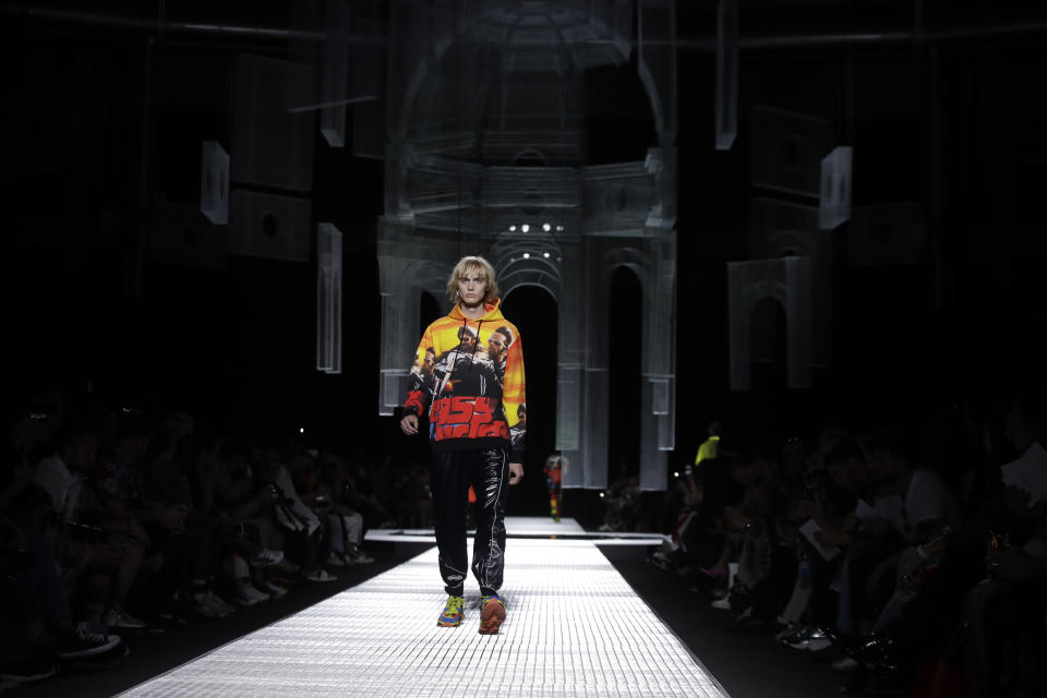 A model wears a creation as part of the Marcelo Burlon men's Spring-Summer 2020 collection, unveiled during the fashion week, in Milan, Italy, Saturday, June 15, 2019. (AP Photo/Luca Bruno)