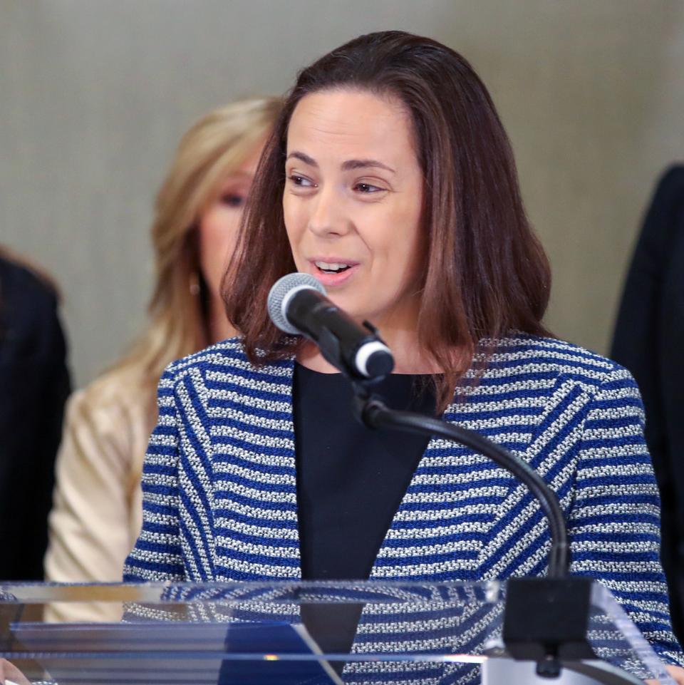 Attorney Alla Lefkowitz makes a statement during a press conference announcing the filing of a lawsuit against the store that sold the gun used in the Old National Bank shooting. January 23, 2024