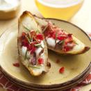 <p>Reduced-fat sour cream and Pecorino cheese make these loaded potato skins lighter than the typical recipe, but just as flavorful. </p><p><strong><em><a href="https://www.womansday.com/food-recipes/food-drinks/recipes/a32505/potato-skins-recipe-ghk1010/" rel="nofollow noopener" target="_blank" data-ylk="slk:Get the Potato Skins recipe;elm:context_link;itc:0;sec:content-canvas" class="link ">Get the Potato Skins recipe</a>. </em></strong></p>