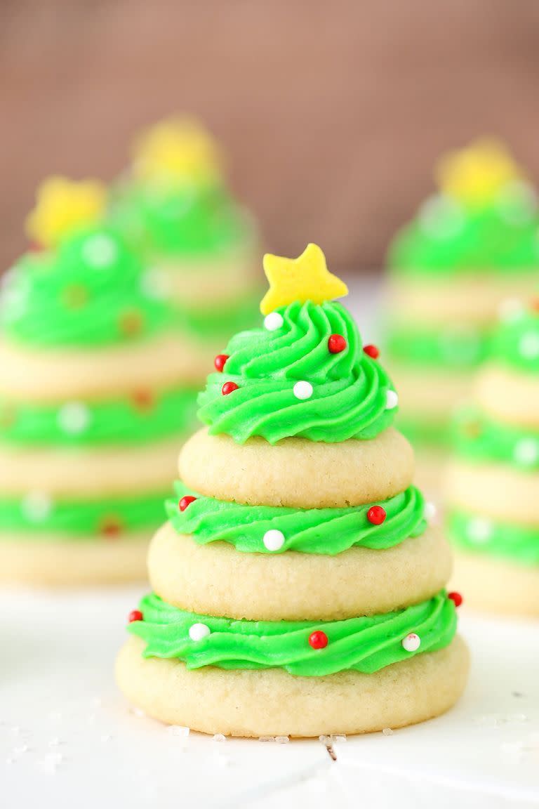 <p>Ask yourself, would you rather decorate a real tree, or a sugar cookie Christmas tree?</p><p>Get the <a href="https://www.delish.com/uk/cooking/recipes/a34036469/christmas-tree-cookie-stacks/" rel="nofollow noopener" target="_blank" data-ylk="slk:Christmas Tree Cookie Stacks" class="link ">Christmas Tree Cookie Stacks</a> recipe. </p>