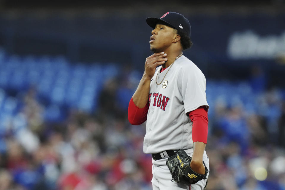 Boston Red Sox starting pitcher Brayan Bello reacts on the mound during the first inning of the team's baseball game against the Toronto Blue Jays on Friday, Sept. 15, 2023, in Toronto. (Chris Young/The Canadian Press via AP)