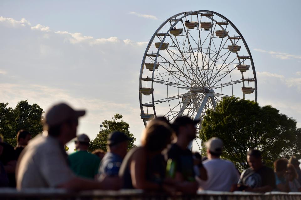 A ferris wheel carries music fans during the 2022 Beale Street Music Festival at the Fairgrounds at Liberty Park.