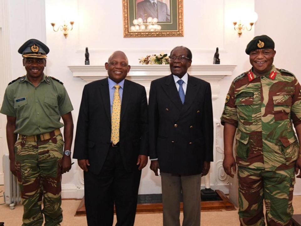 Robert Mugabe met with army commander General Constantino Chiwenga, right (ZBC)