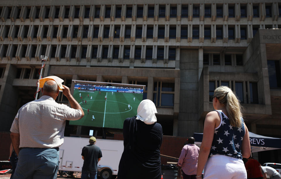 BOSTON, MA - JUNE 24: Spectators watch a broadcast of the Women's World Cup match between the defending champion U.S. national soccer team and Spain at Boston City Hall on June 24, 2019. The U.S. beat Spain, 2-1. (Photo by Erin Clark for The Boston Globe via Getty Images)