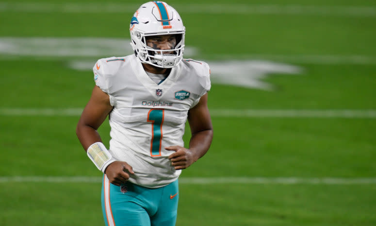 Miami Dolphins quarterback Tua Tagovailoa on the field.