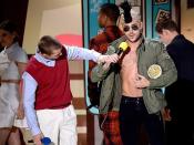 Accepting an award for <em>Neighbors</em>, Efron wore a military-style jacket that partially obscured the left hemisphere of his chest. We didn't hate it. Does this mean we're growing up?