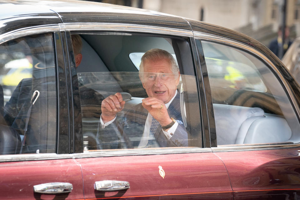 King Charles III leaving Westminster Abbey in central London