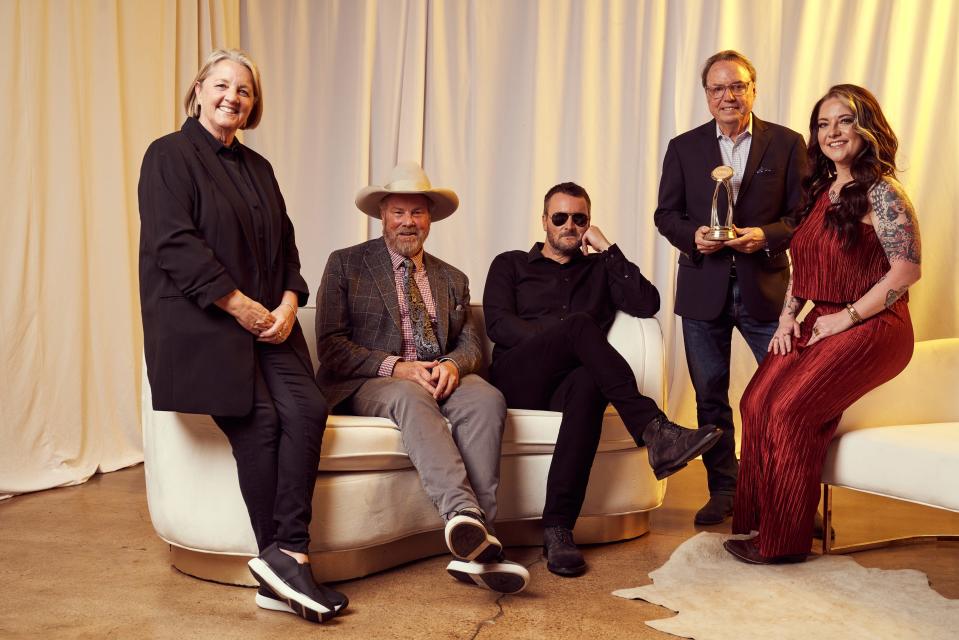 From left, Liz Rose, Robert Earl Keen, Eric Church, Jody Williams  and Ashley McBryde hang out at the CMA Triple Play Awards, held March 1 at Saint Elle in Nashville.