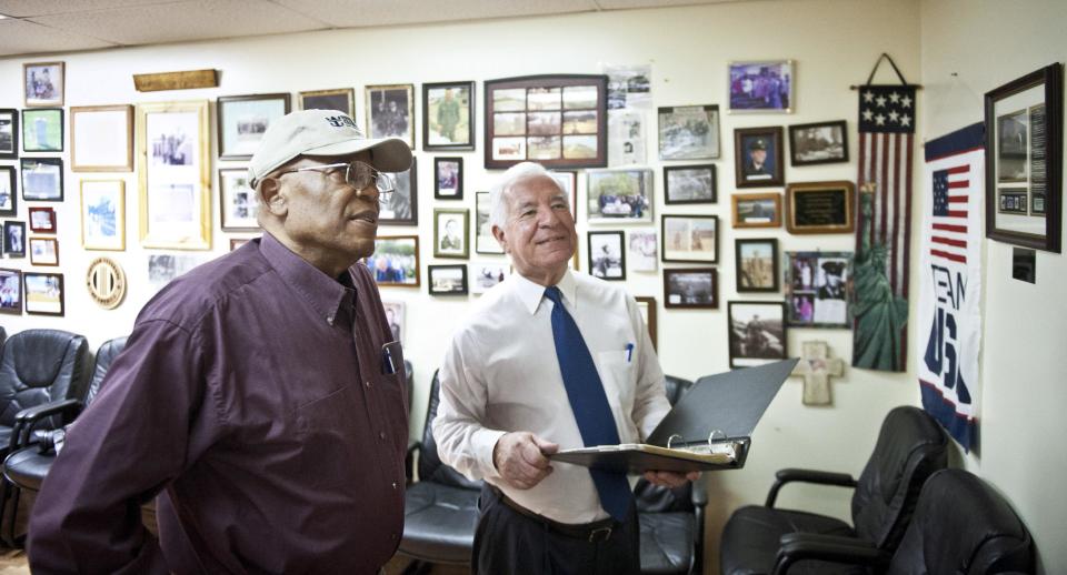 U.S. Rep. Nick Rahall, right, speaks with team leader of the Princeton Veterans Center Sam Heflin during a tour of the veterans facility in Princeton, W.Va., Monday, April 21, 2014. In a state where Republicans are breaking losing streaks that predate the Eisenhower administration, Rahall, a nearly 40-year Democratic House incumbent, is one of the GOP’s top targets. (AP Photo/Michael Shroyer)