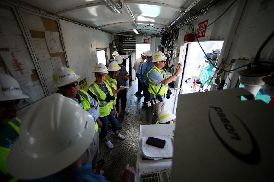 A group of media watch the crewmen work during a tour of a drilling rig at the FORGE geothermal demonstration sight near Milford on Thursday, July 6, 2023. | Scott G Winterton, Deseret News