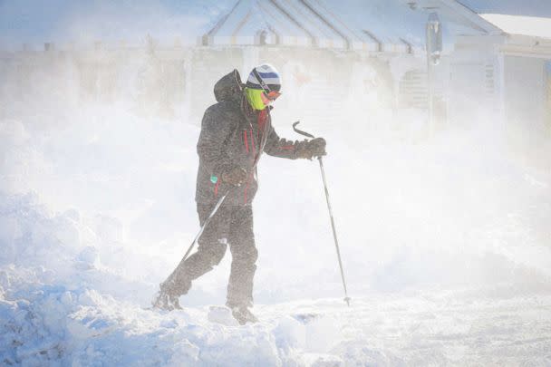 PHOTO: A man skis following a winter storm that hit the Buffalo region on Main Street in Amherst, N.Y., Dec. 25, 2022. (Brendan McDermid/Reuters)