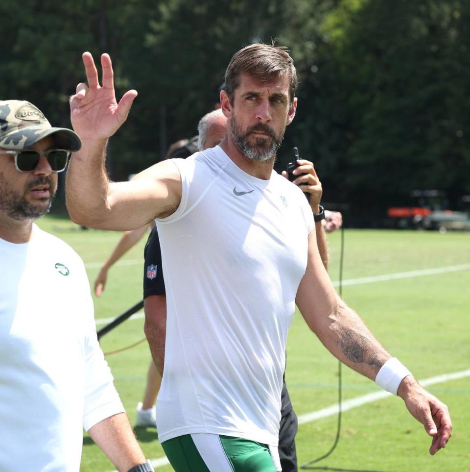 New York Jets quarterback Aaron Rodgers waves to the cheering fans following the team’s joint practice with the Carolina Panthers on Wednesday, August 9, 2023 at Wofford College in Spartanburg, SC.