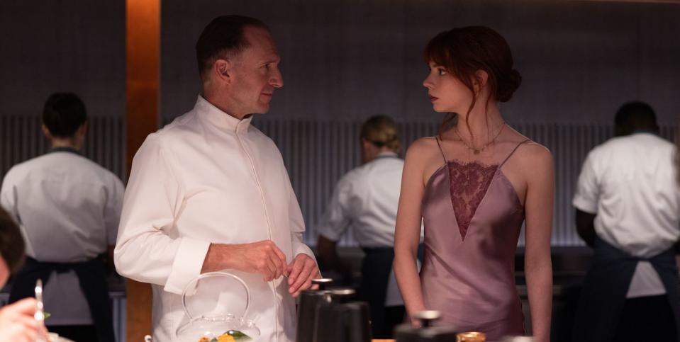 ralph fiennes and anya taylor joy in the film the menu photo by eric zachanowich courtesy of searchlight pictures © 2022 20th century studios all rights reserved
