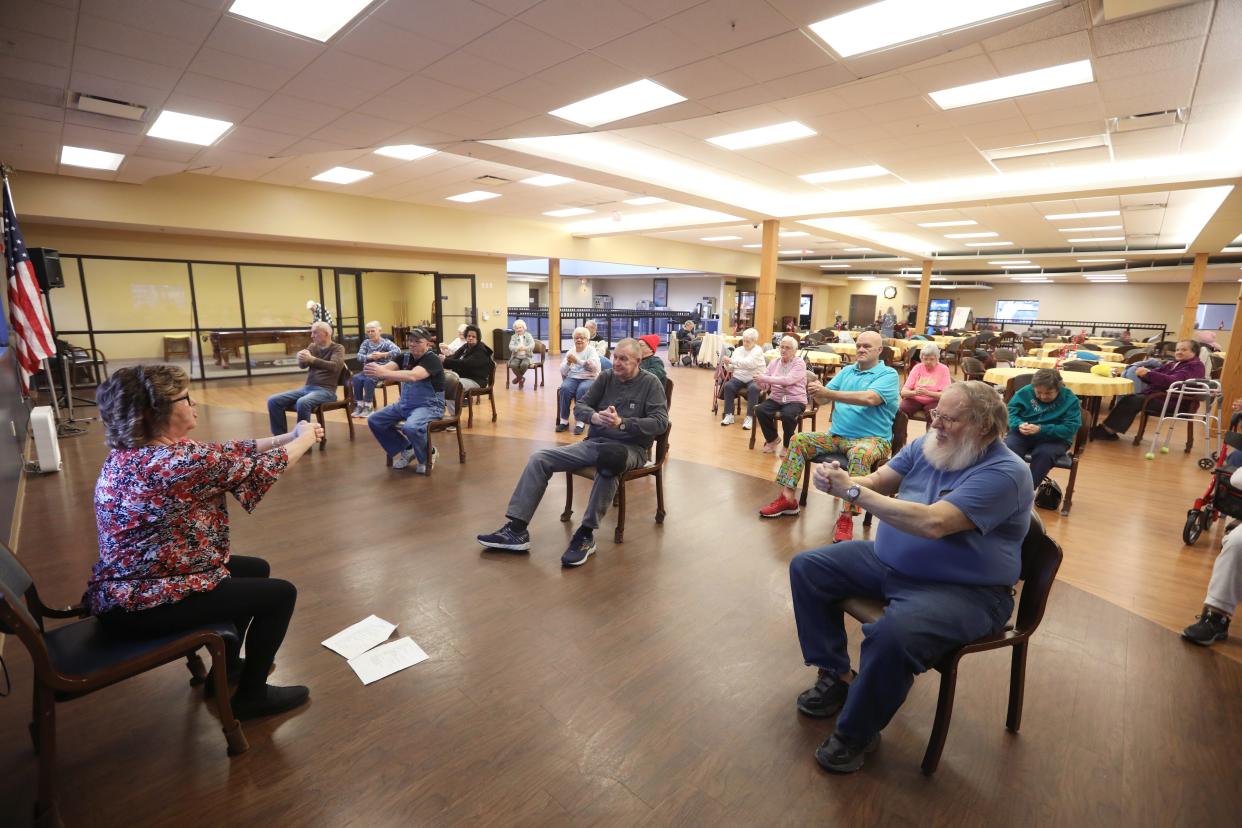 Muskingum County Center for Seniors Activities Director Tara McGuire leads an arthritis class at the center on Monday. The class is one of dozens of events held at the center, and helps seniors with excersises to battle arthritis.