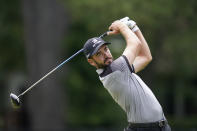 Troy Merritt drives off the fourth tee during the third round of the Rocket Mortgage Classic golf tournament, Saturday, July 3, 2021, at the Detroit Golf Club in Detroit. (AP Photo/Carlos Osorio)