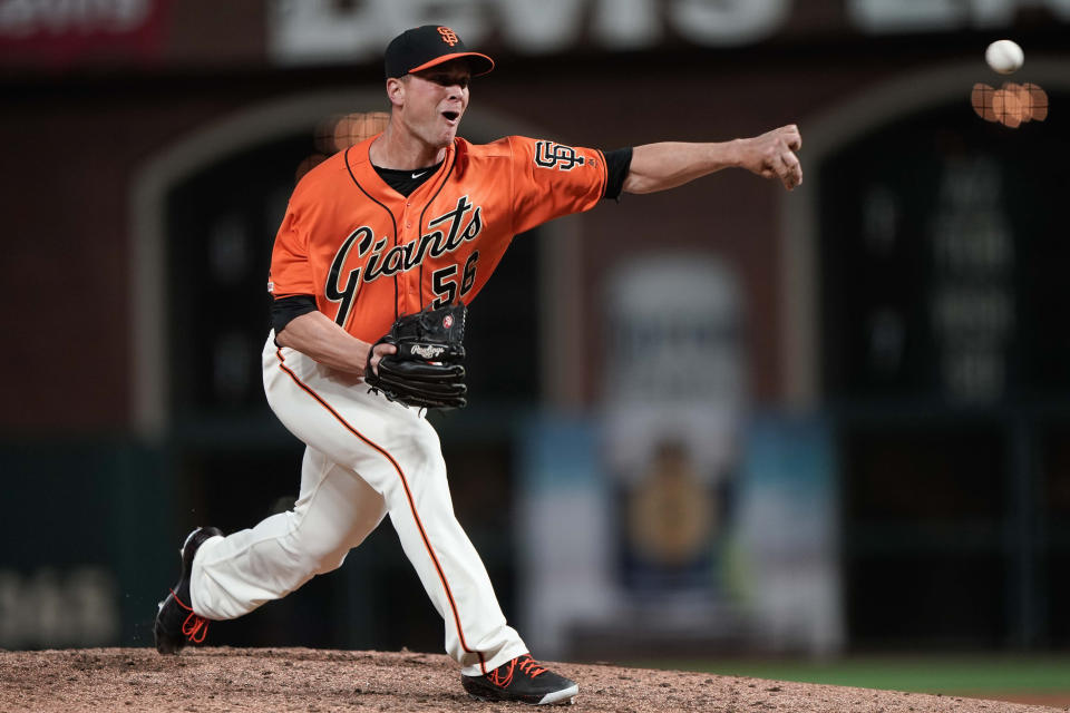 Jun 7, 2019; San Francisco, CA, USA; San Francisco Giants relief pitcher Tony Watson (56) pitches against the Los Angeles Dodgers during the eighth inning at Oracle Park. Mandatory Credit: Stan Szeto-USA TODAY Sports