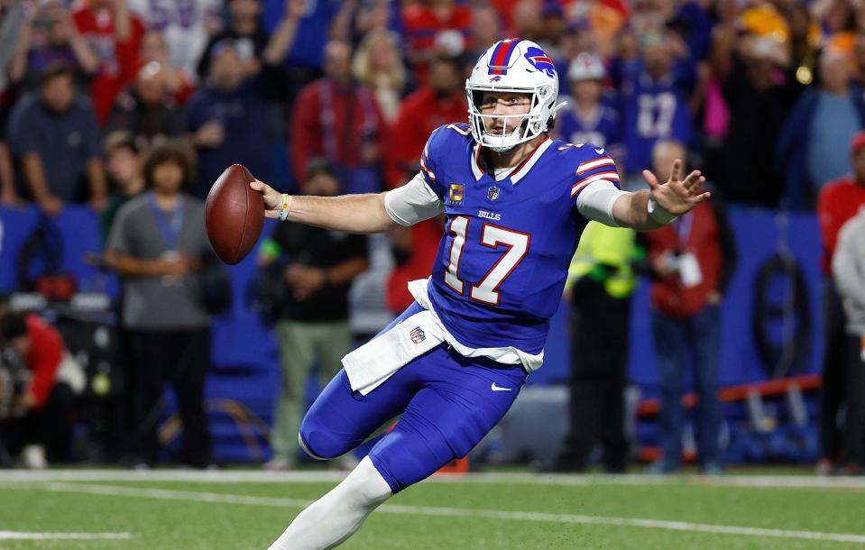 Buffalo Bills quarterback Josh Allen (17) finds running room against Tampa Bay. Allen rushed for 41-yards.