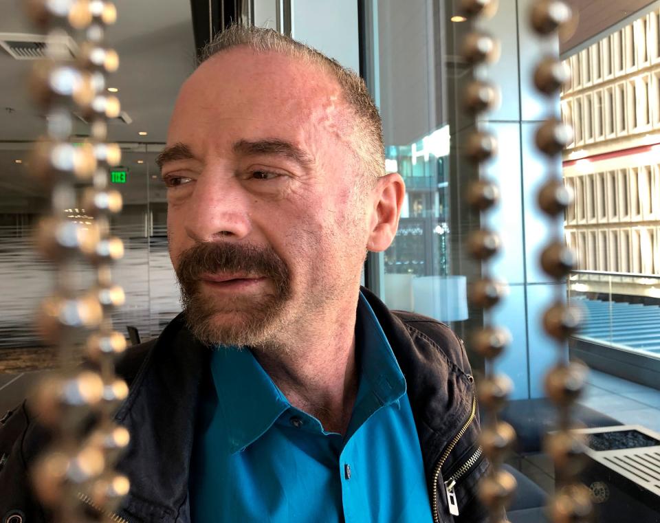 Timothy Ray Brown poses for a photograph, Monday, March 4, 2019, in Seattle. Brown, also known as the "Berlin patient," was the first person to be cured of HIV infection, more than a decade ago.