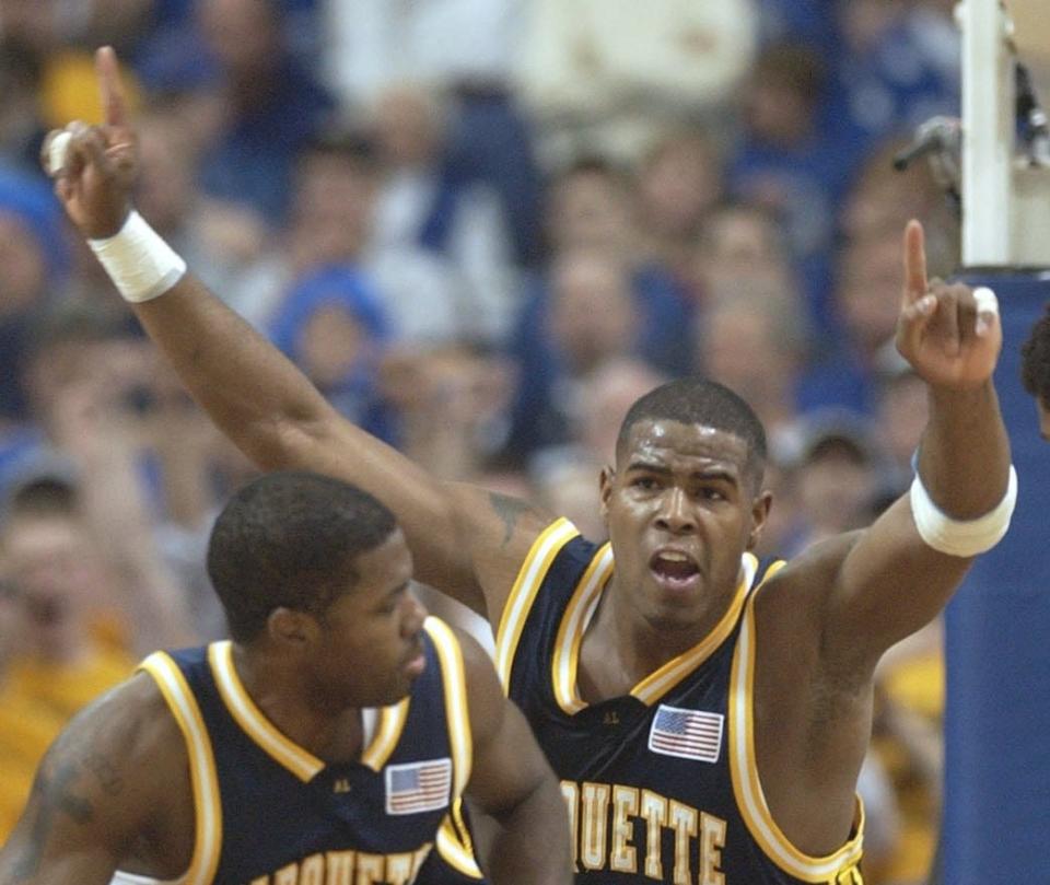 Robert Jackson reacts to two of his points over Kentucky. Marquette advances to the final four.