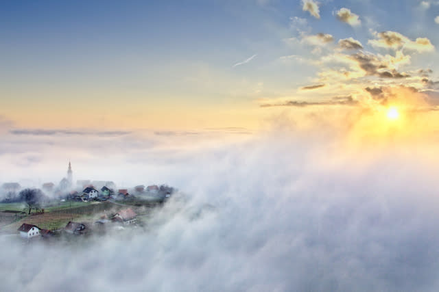 Where is this sleepy  village lost in a sea of clouds?