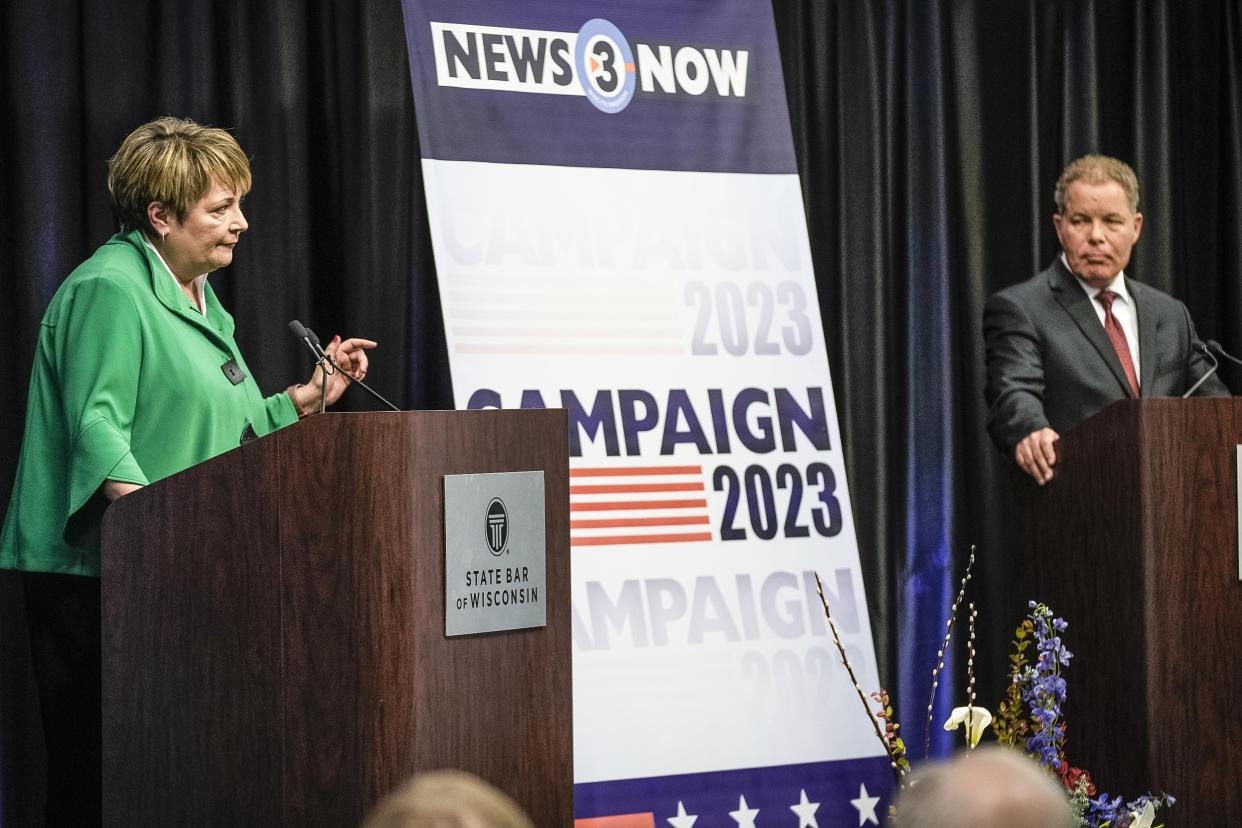 Image: Wisconsin Supreme Court candidates Republican-backed Dan Kelly and Democratic-supported Janet Protasiewicz participate in a debate on March 21, 2023, in Madison, Wis.  (Morry Gash / AP)