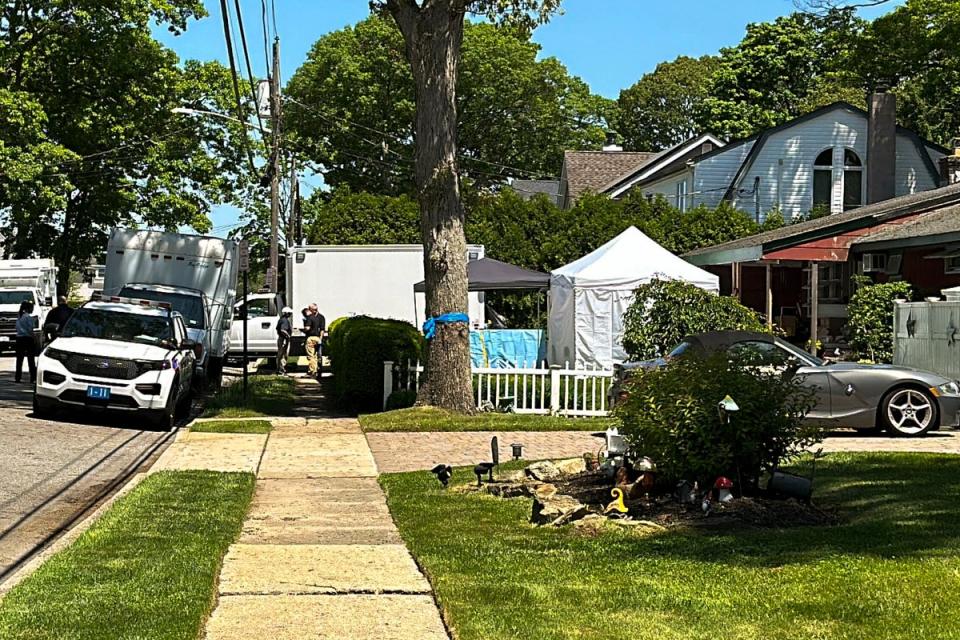 Suffolk County police outside the home of Rex Heuermann during the latest search in May (Copyright 2024 The Associated Press. All rights reserved.)