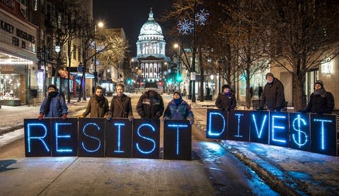 <span class="caption">The fossil fuel divestment movement has support across the world.</span> <span class="attribution"><a class="link " href="https://flickr.com/photos/depthandtime/16348943217/in/photolist-qUGBek-FYWb4m-t9XAZ3-J1Wy4G-J1WxRY-raBGwD-FYWazf-Gp3xjr-CDUktd-muJiPa-FYWaTG-H1d8oM-niK6AV-2g2moRp-qTk8fx-23AwnQy-s4gG6B-H4iRd5-qWyiLR-H1d76g-2drodSR-YgtEtw-24Fi1h8-muJWke-muLd5u-muJj2K-muJjaa-jCRF11-muJWrX-muJjBT-muJjGT-23j9Do8-muLdSm-UxtW6u-muLdWE-muLe3S-H1d9qr-JhkdK1-GeJ4LN-qesUDD-JhkcRC-T4f4MG-2hm21GZ-J1JVAC-T4f4mG-Jhkdum-T4f3Y7-21VjGih-23j9CzK-Jhkdem" rel="nofollow noopener" target="_blank" data-ylk="slk:depthandtime/flickr;elm:context_link;itc:0;sec:content-canvas">depthandtime/flickr</a>, <a class="link " href="http://creativecommons.org/licenses/by-nc/4.0/" rel="nofollow noopener" target="_blank" data-ylk="slk:CC BY-NC;elm:context_link;itc:0;sec:content-canvas">CC BY-NC</a></span>