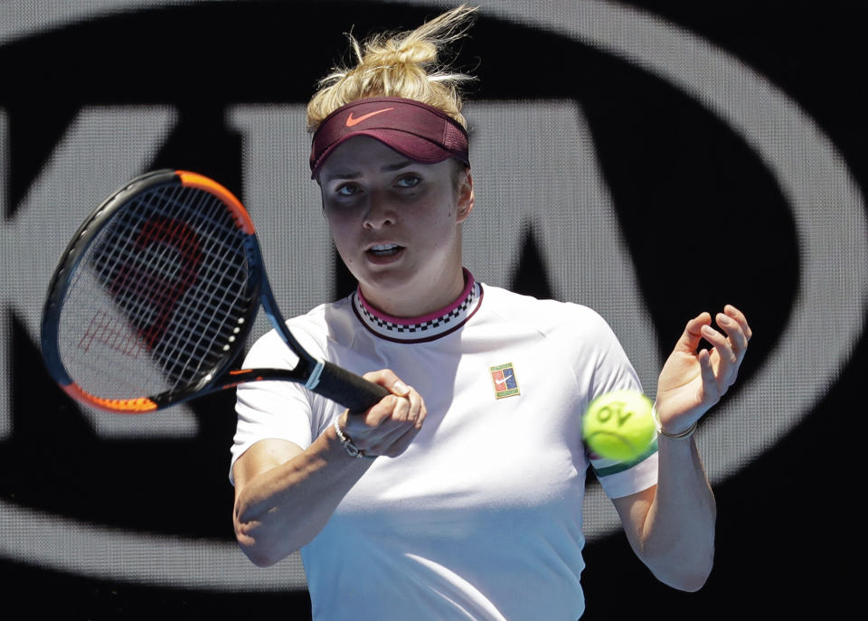 Ukraine's Elina Svitolina makes a forehand return to United States' Madison Keys during their fourth round match at the Australian Open tennis championships in Melbourne, Australia, Monday, Jan. 21, 2019. (AP Photo/Aaron Favila)