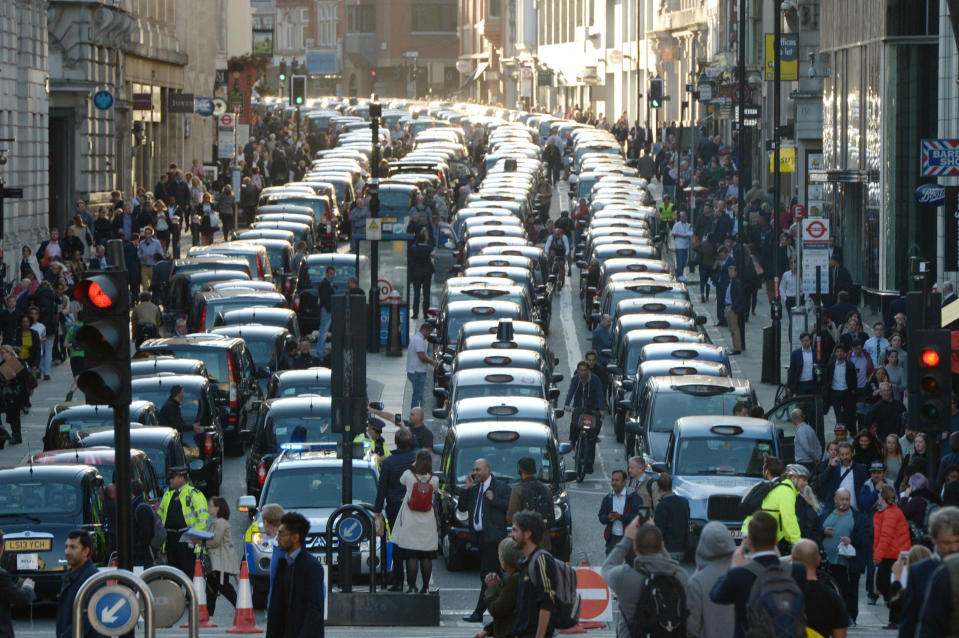 Black cab drivers stage a central London protest against Uber in September 2015. (PA)