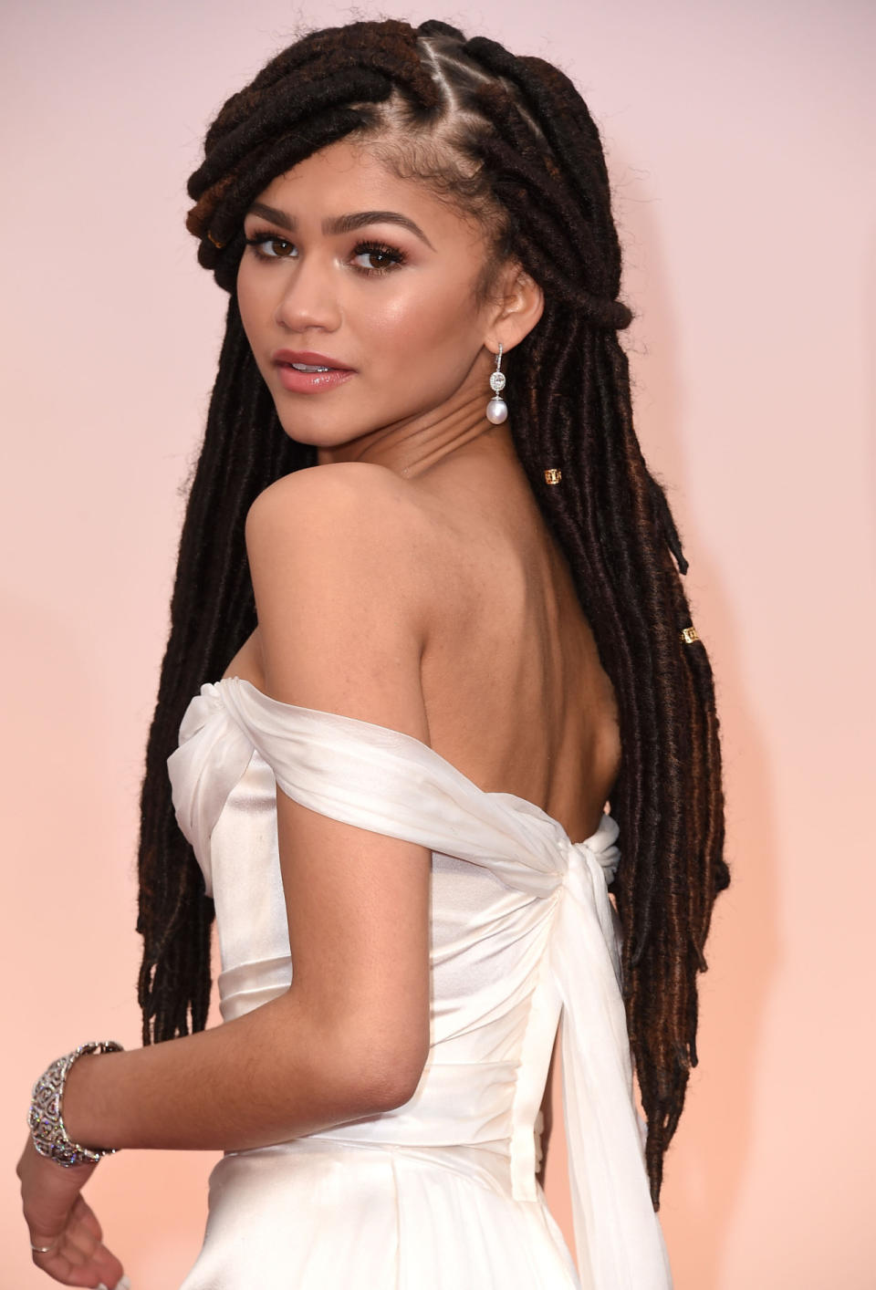 These infamous dreadlocks, worn at the 87th Annual Academy Awards, sparked internet controversy and conversation after Giuliana Rancic made offensive comments about Zendaya and her choice of hairstyle. Zendaya later responded that she chose to wear locs in order to show people that black hair can be beautiful too.